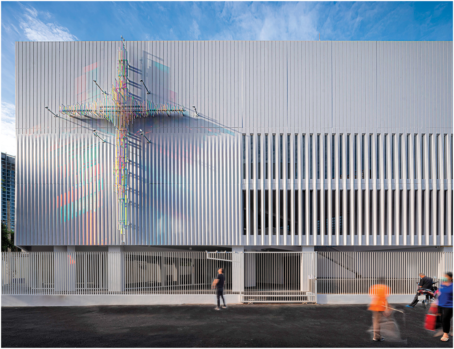A white building with a large white tower