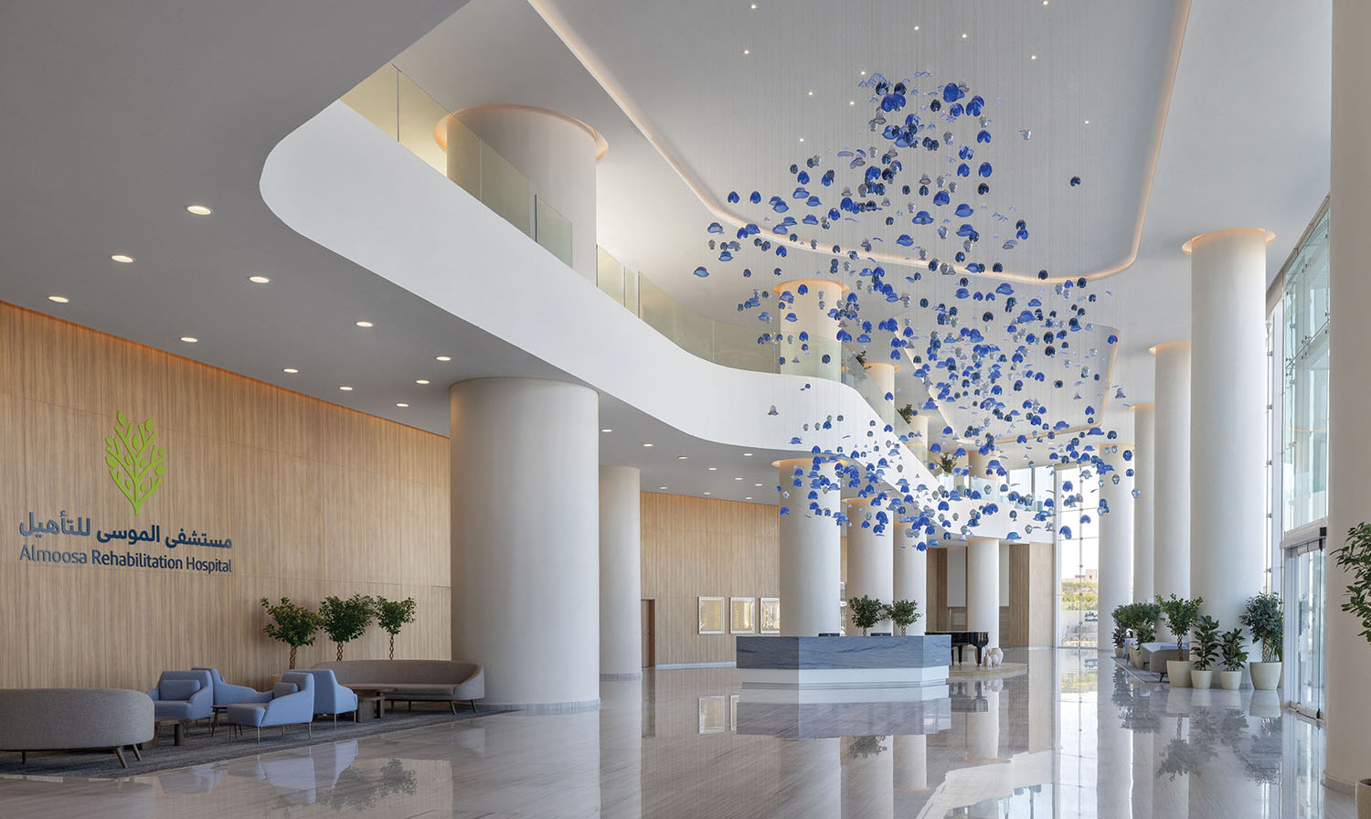 A lobby with a large chandel and a large chandel