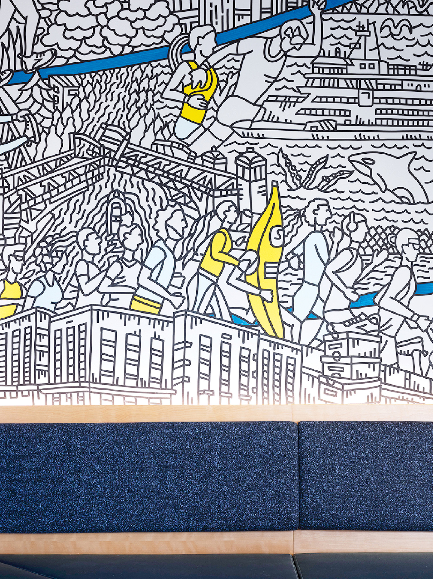 A couch with a painting on it