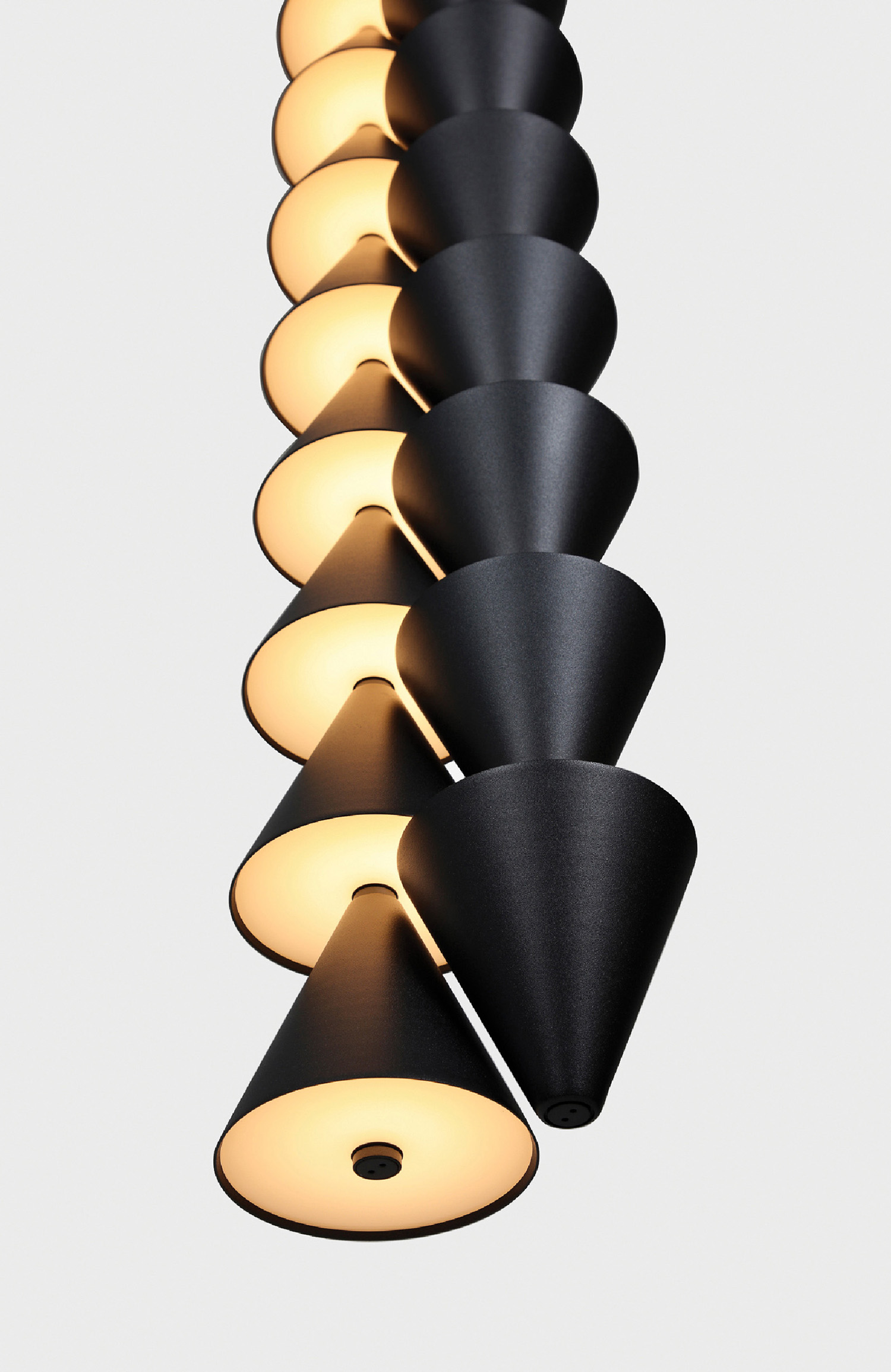 A black lamp with five lights on it.