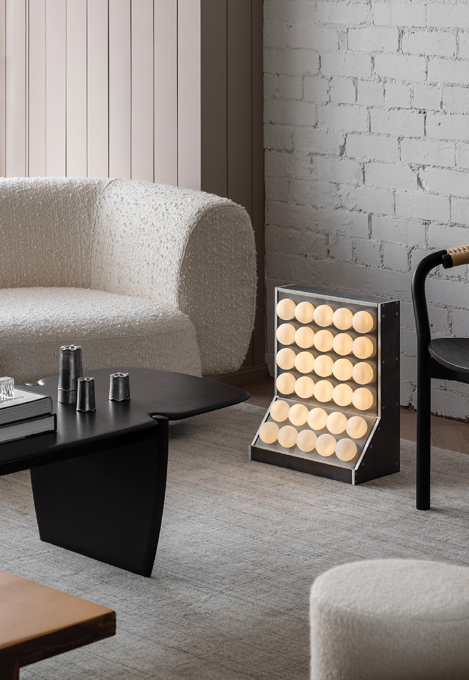 A living room with a couch, coffee table and a coffee table.