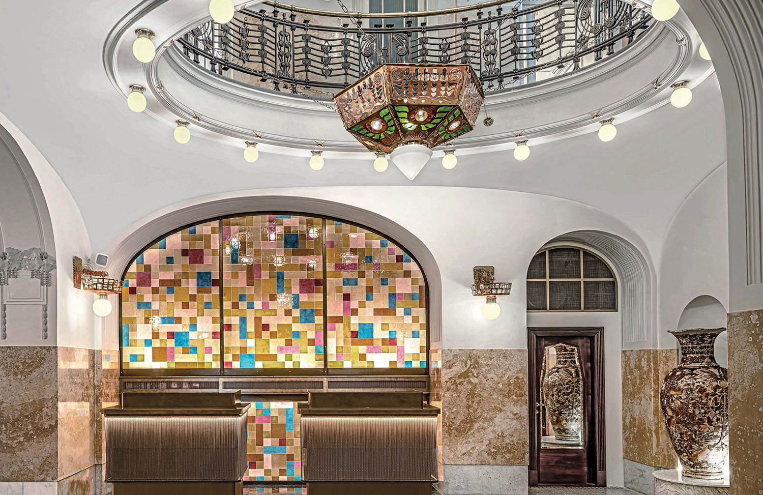 A large room with a large chandel and a large chandel.