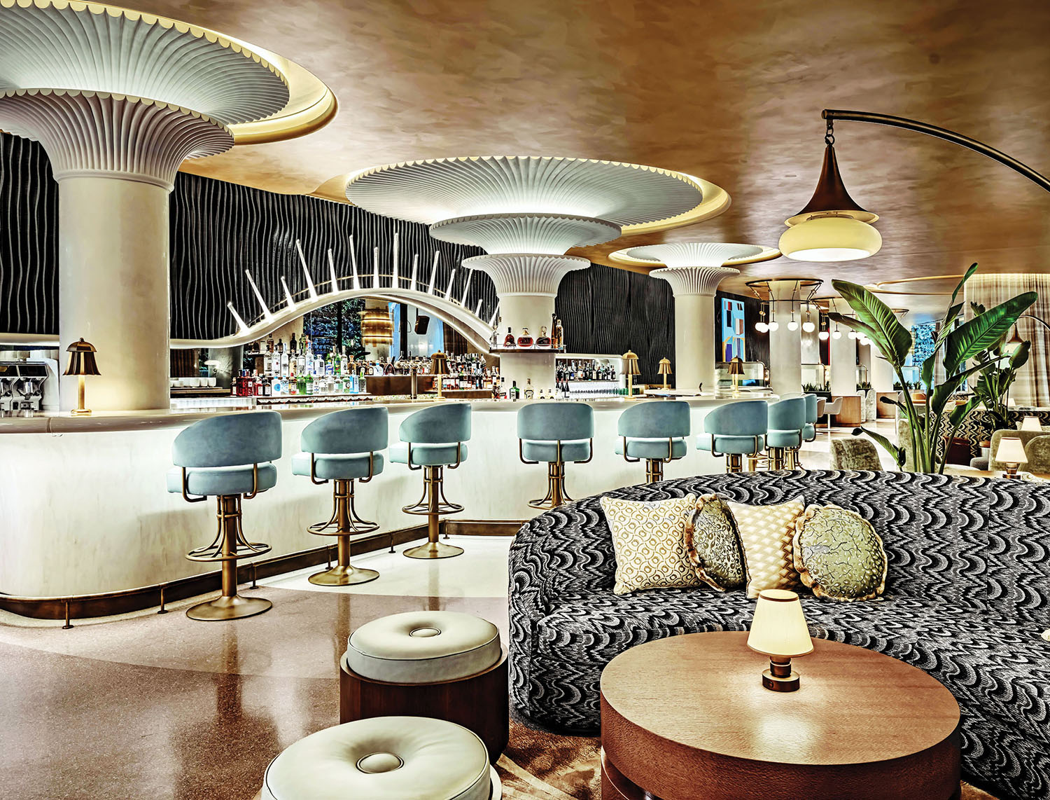 A bar with a bar and a large round table.