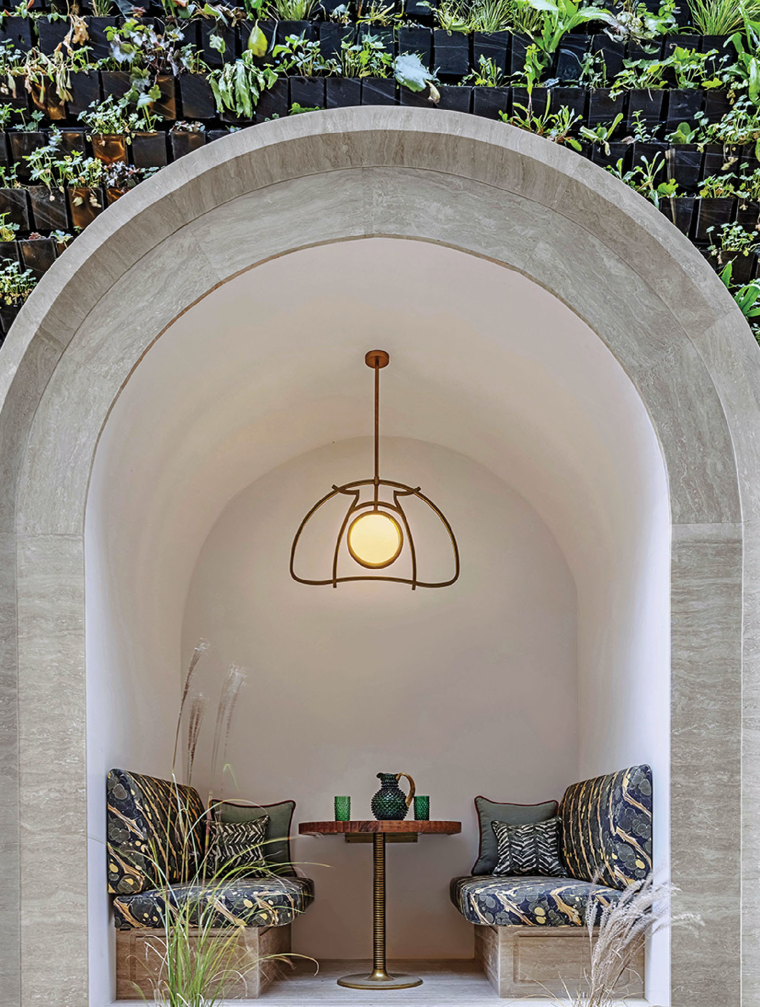 A garden seating nook with pillows