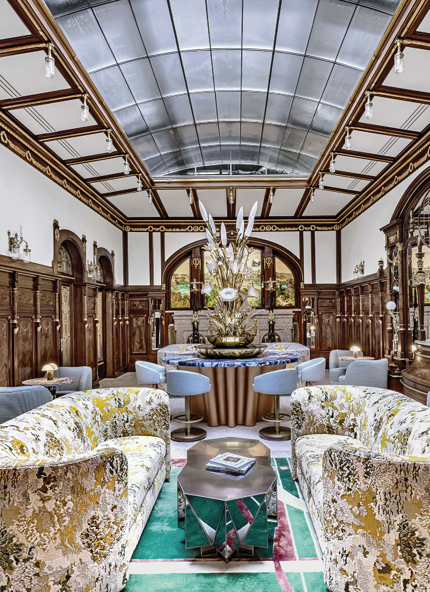 A room with a lot of furniture and a chandelier.