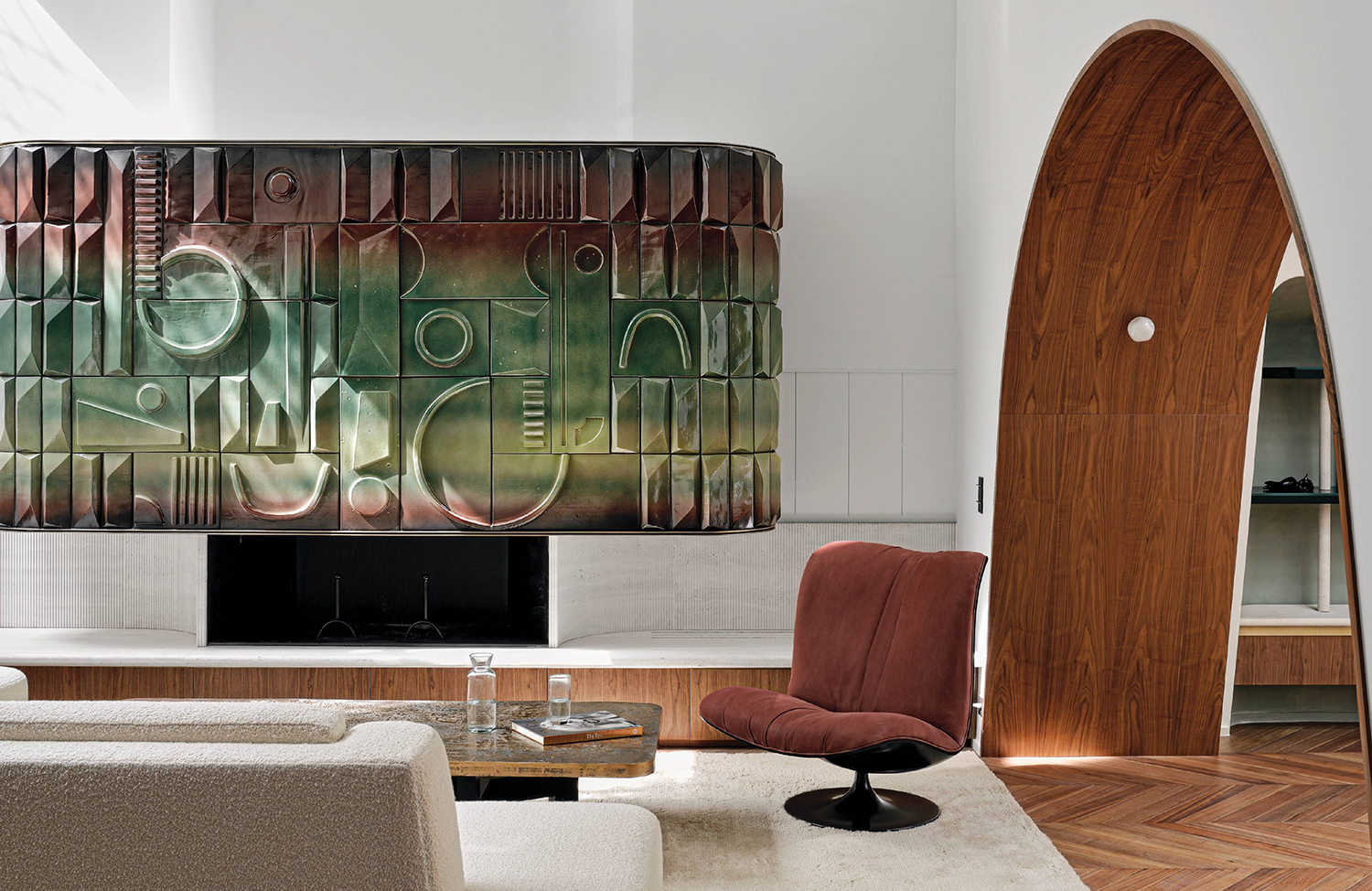 A living room with a large painting on the wall