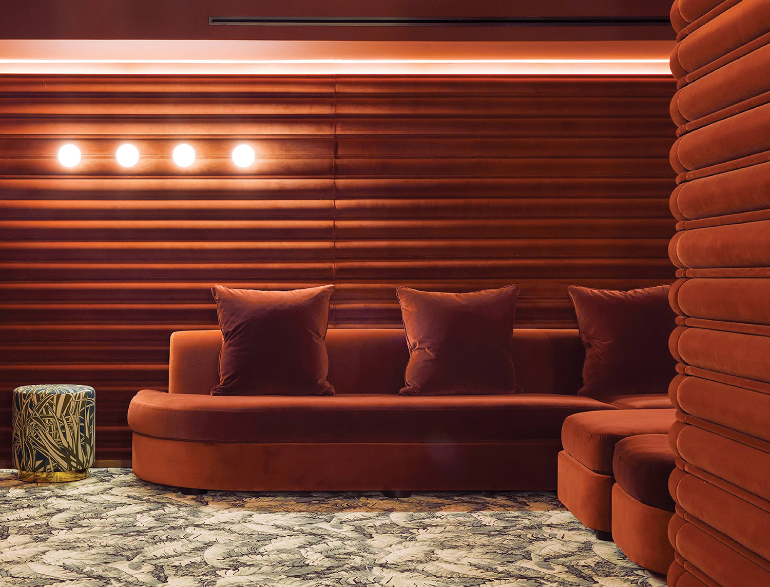 A living room with a couch and a table