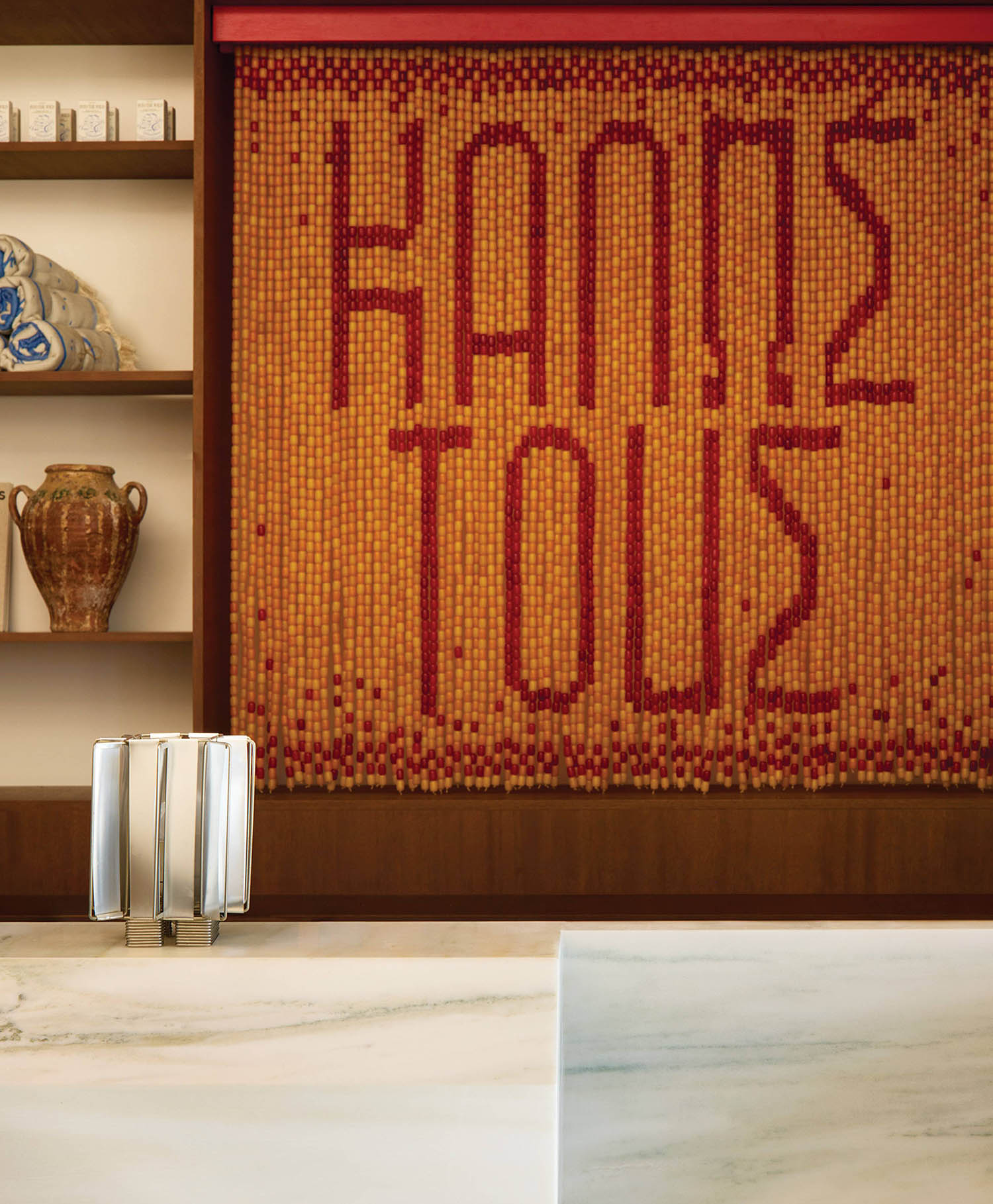 A kitchen counter with a large tile tile.