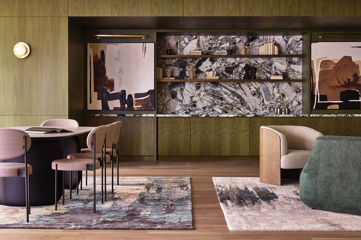 A living room with a large painting on the wall.