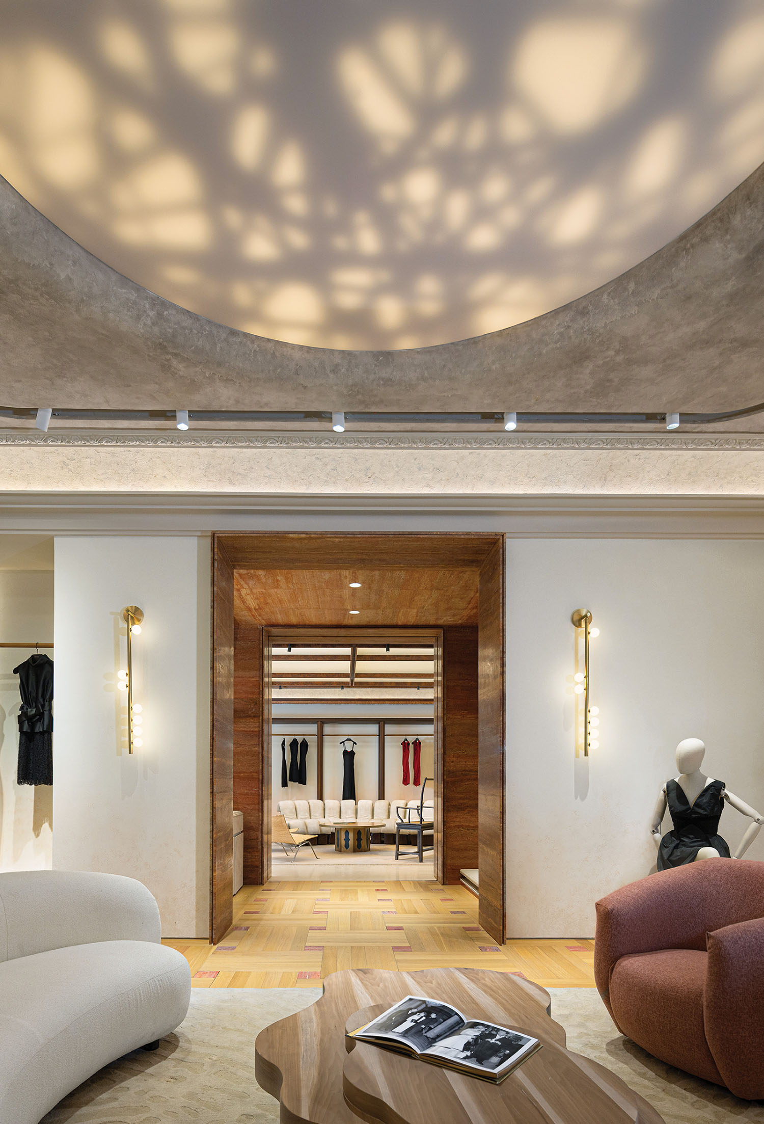 A living room with a couch and a table.