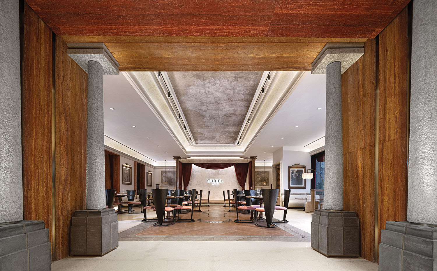 A large room with a large wooden ceiling.