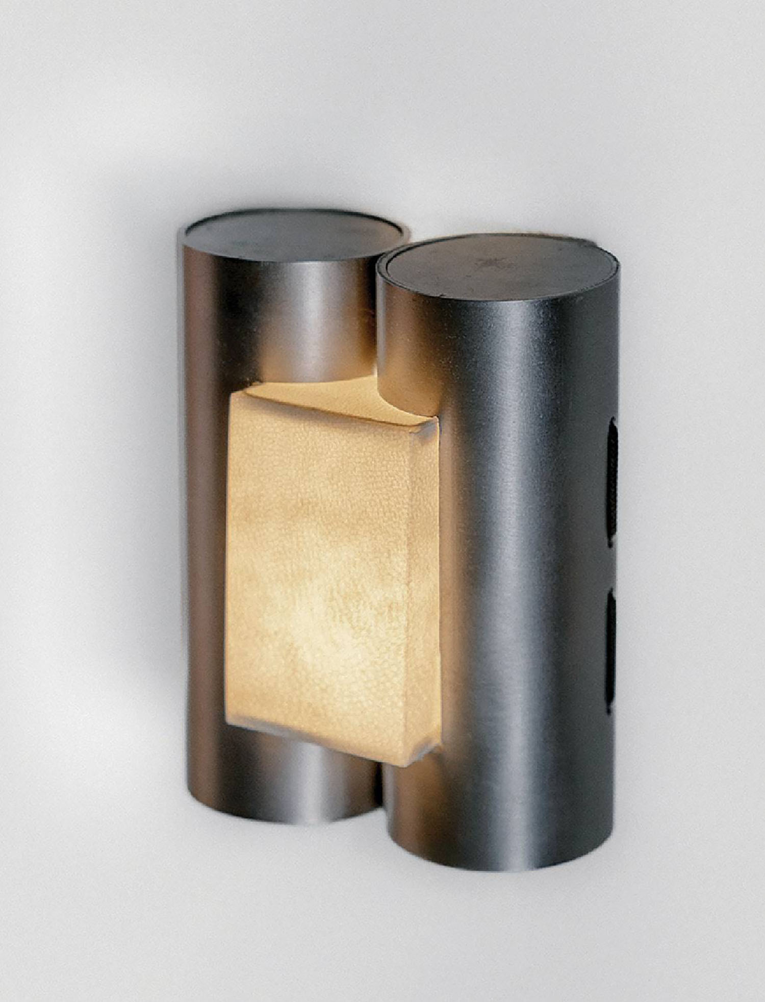 A wall light with a rectangular surface and a rectangular surfac.