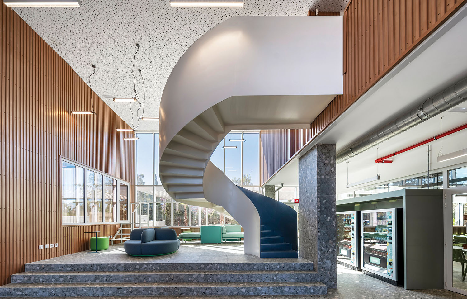 a spiral staircase in a modern office