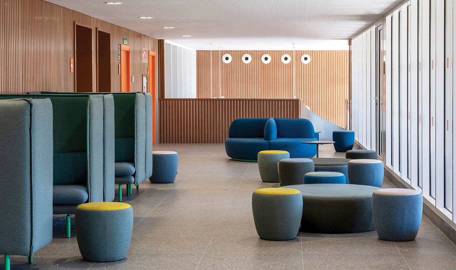 a room with a lot of chairs and tables