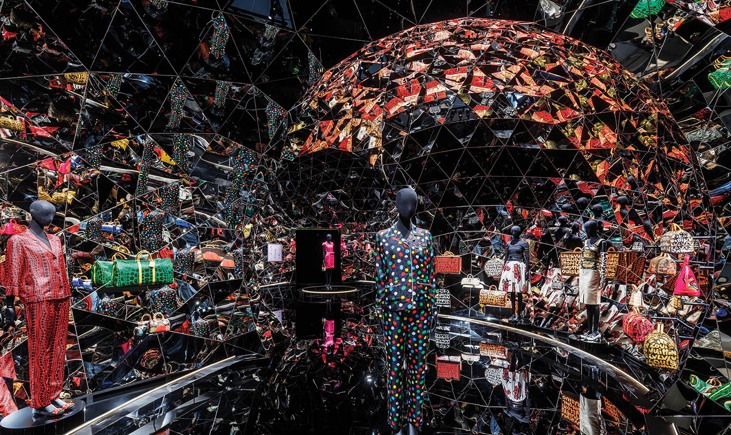 A large mirror ball with many different items.