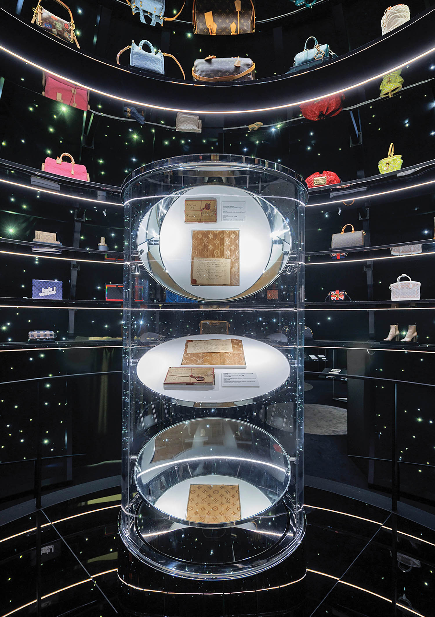 A display of various types of objects in a glass case.