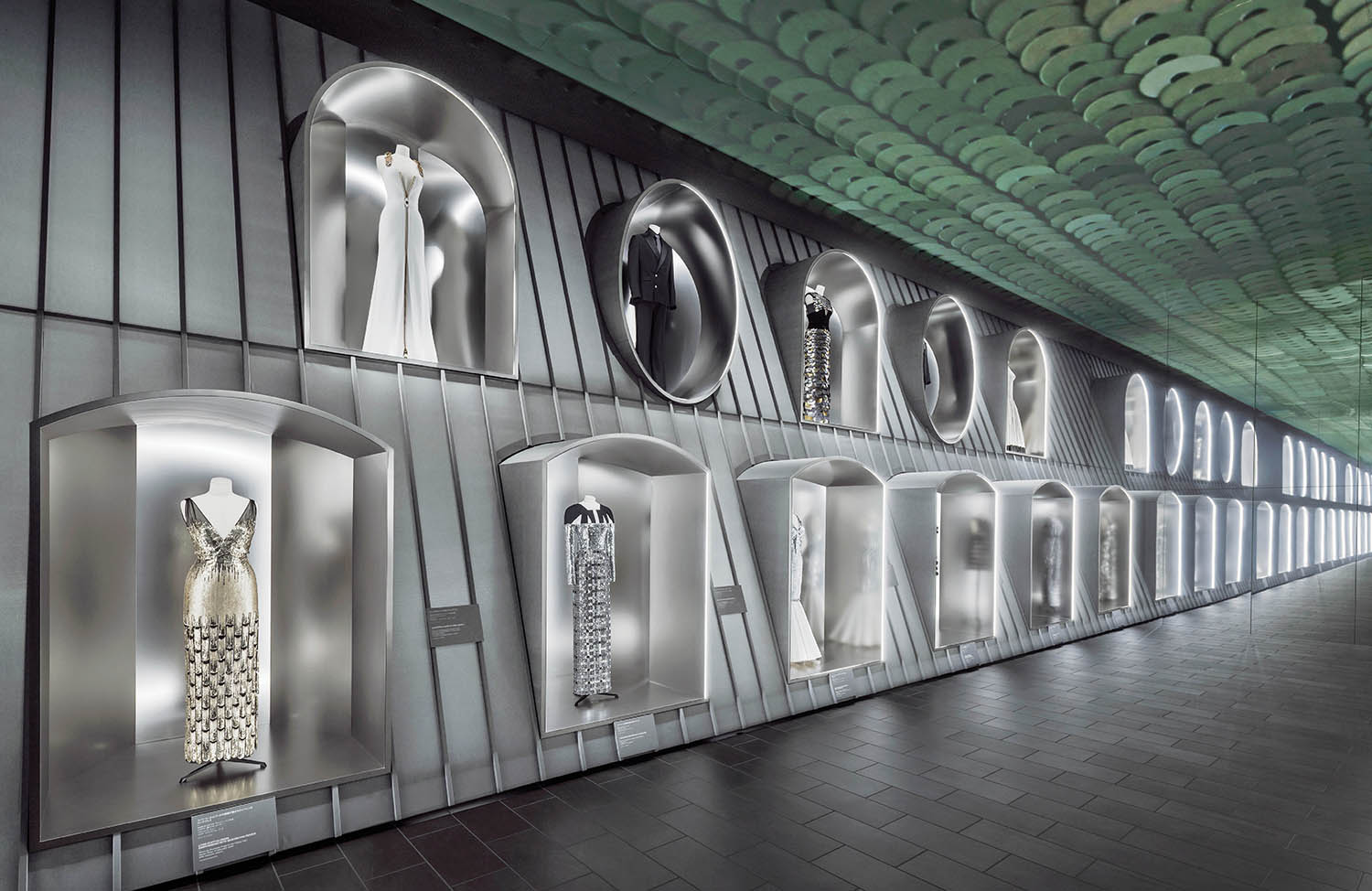 A wall with many different types of clothing.