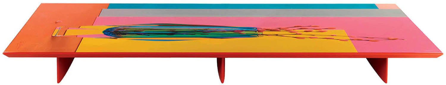 A colorful table with a painting on it.