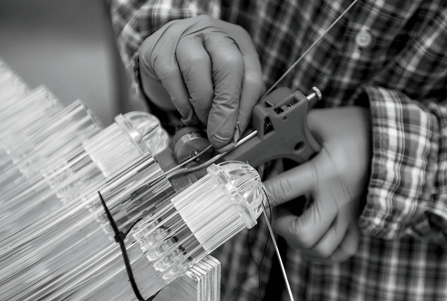 A person is making a piece of glass