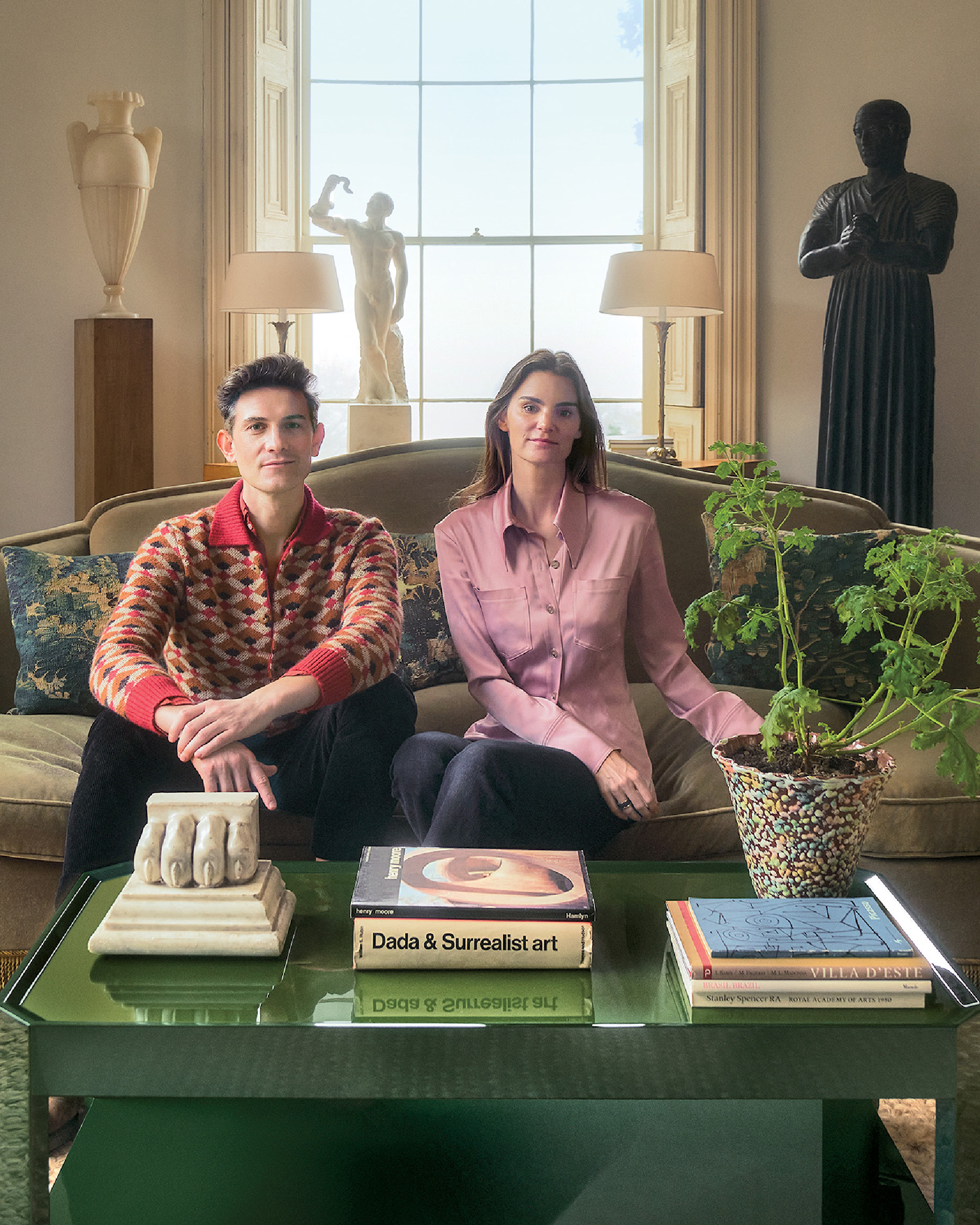 A man and woman sitting on a couch