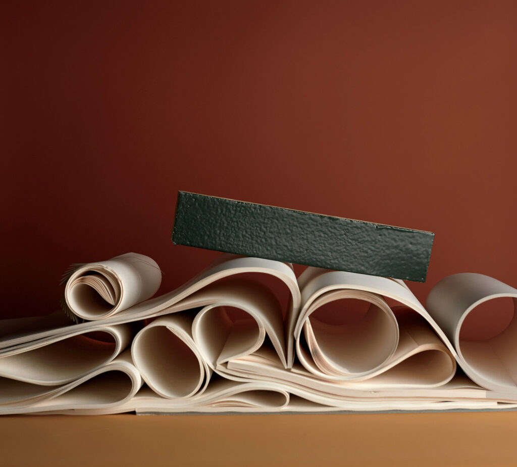 A pile of paper with a piece of paper sticking out of it