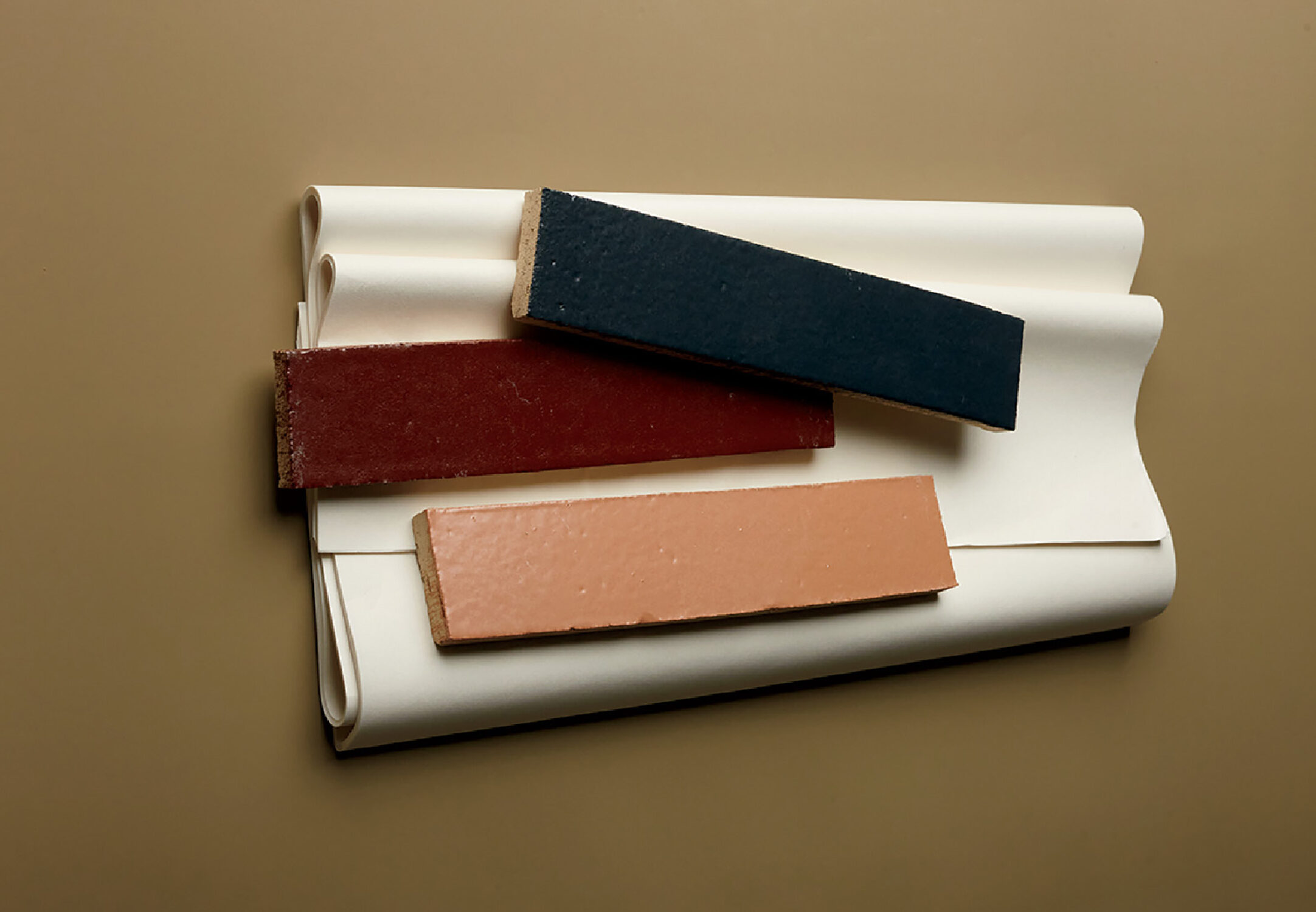 Three different colored papers on a table