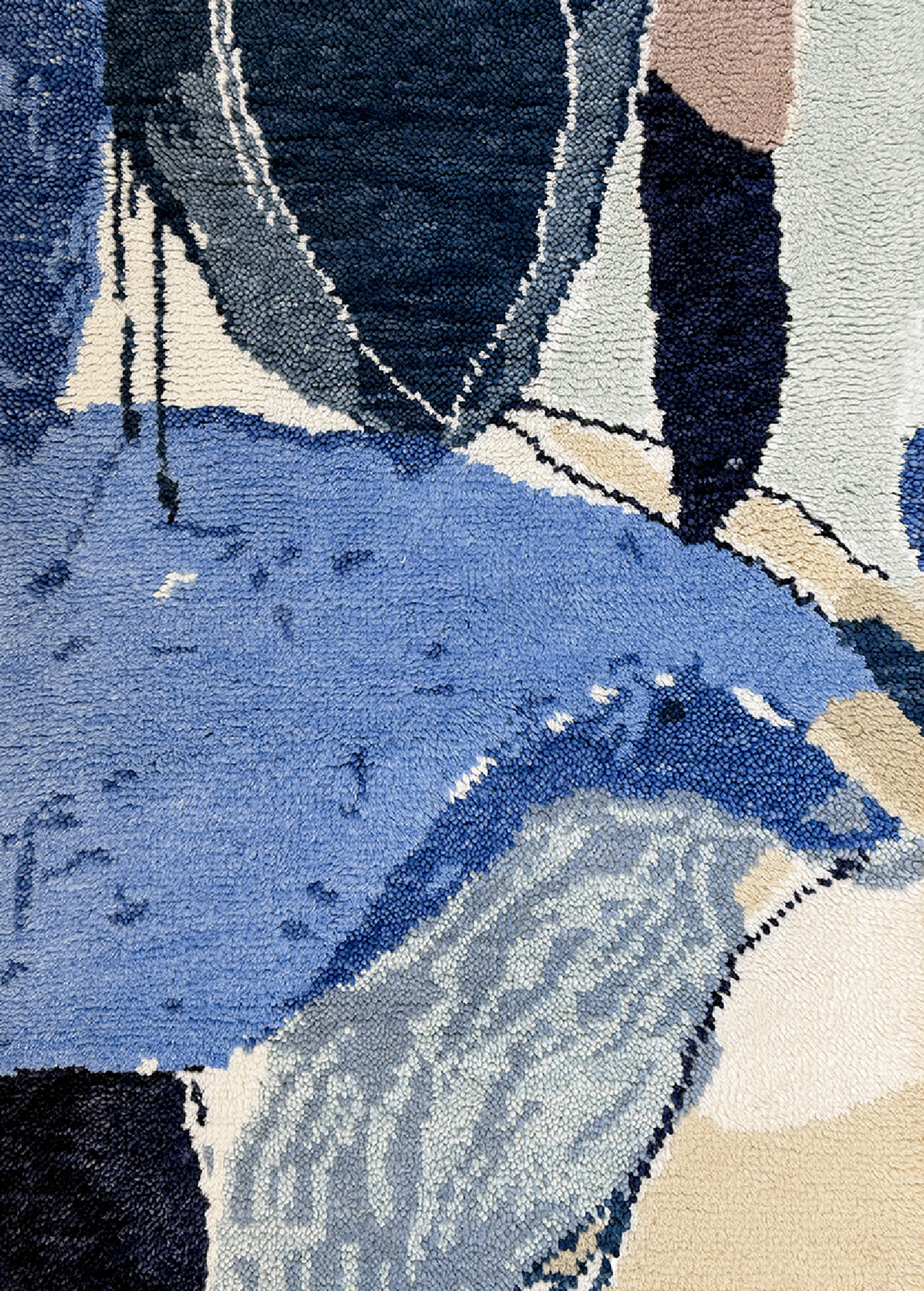 A blue and white rug with a pattern