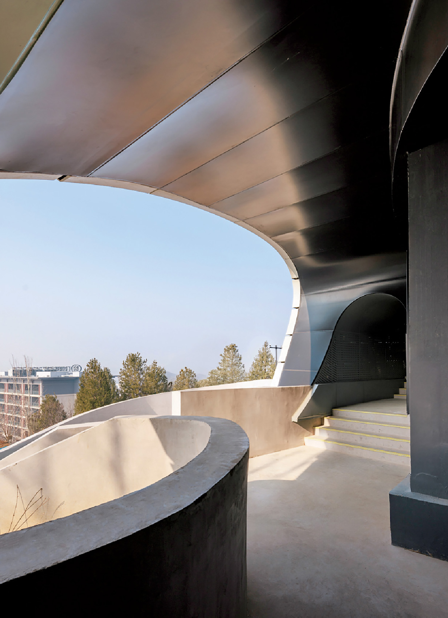 A curved concrete wall