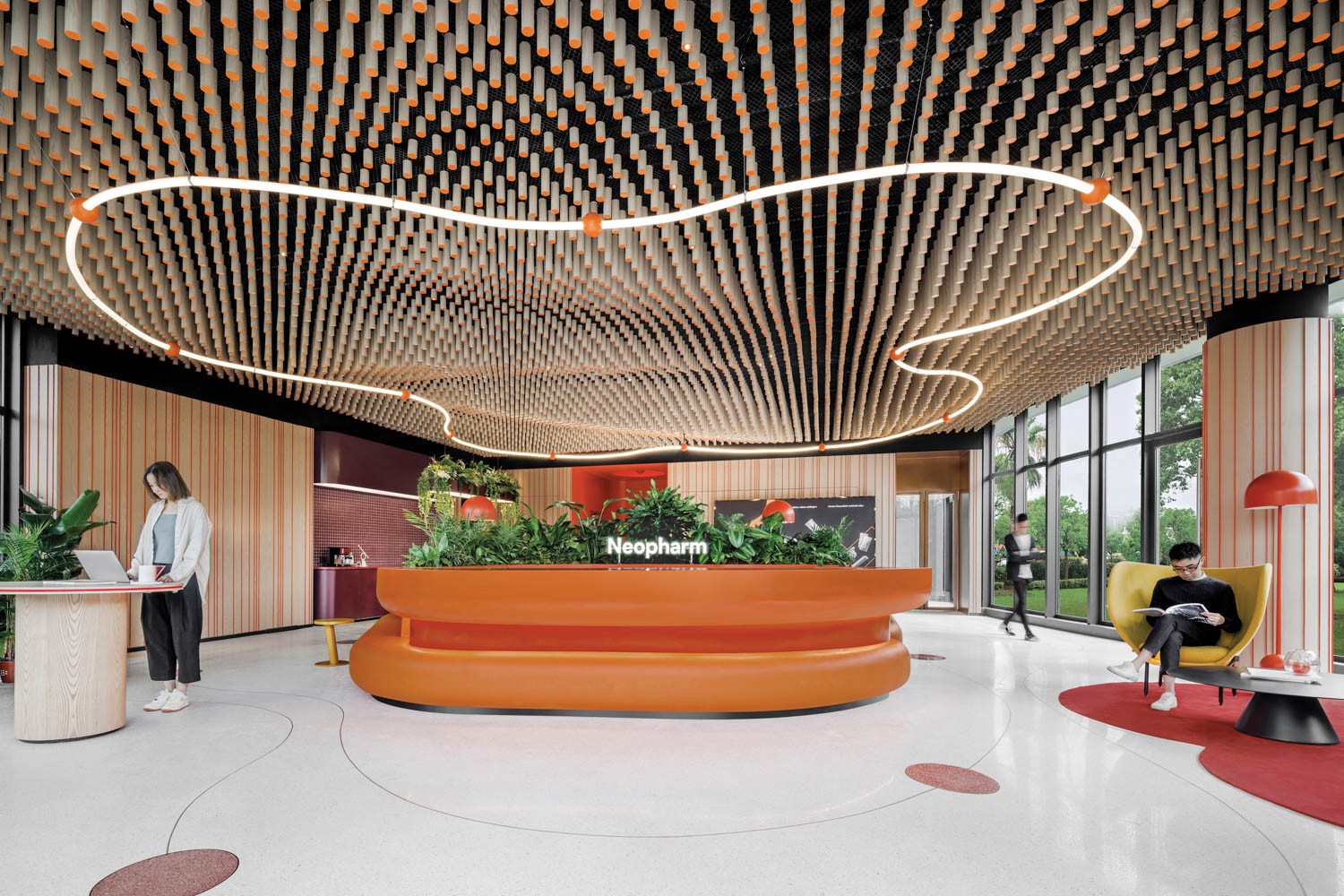 metal rods form an undulating canopy in the lobby of a Shanghai workplace