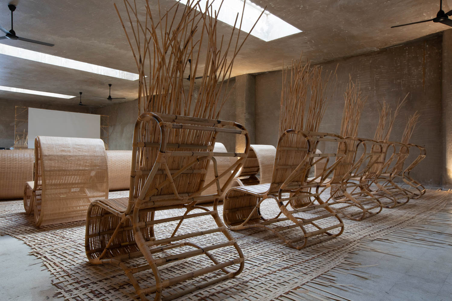 natural fibers seemingly growing out the back of rattan chairs