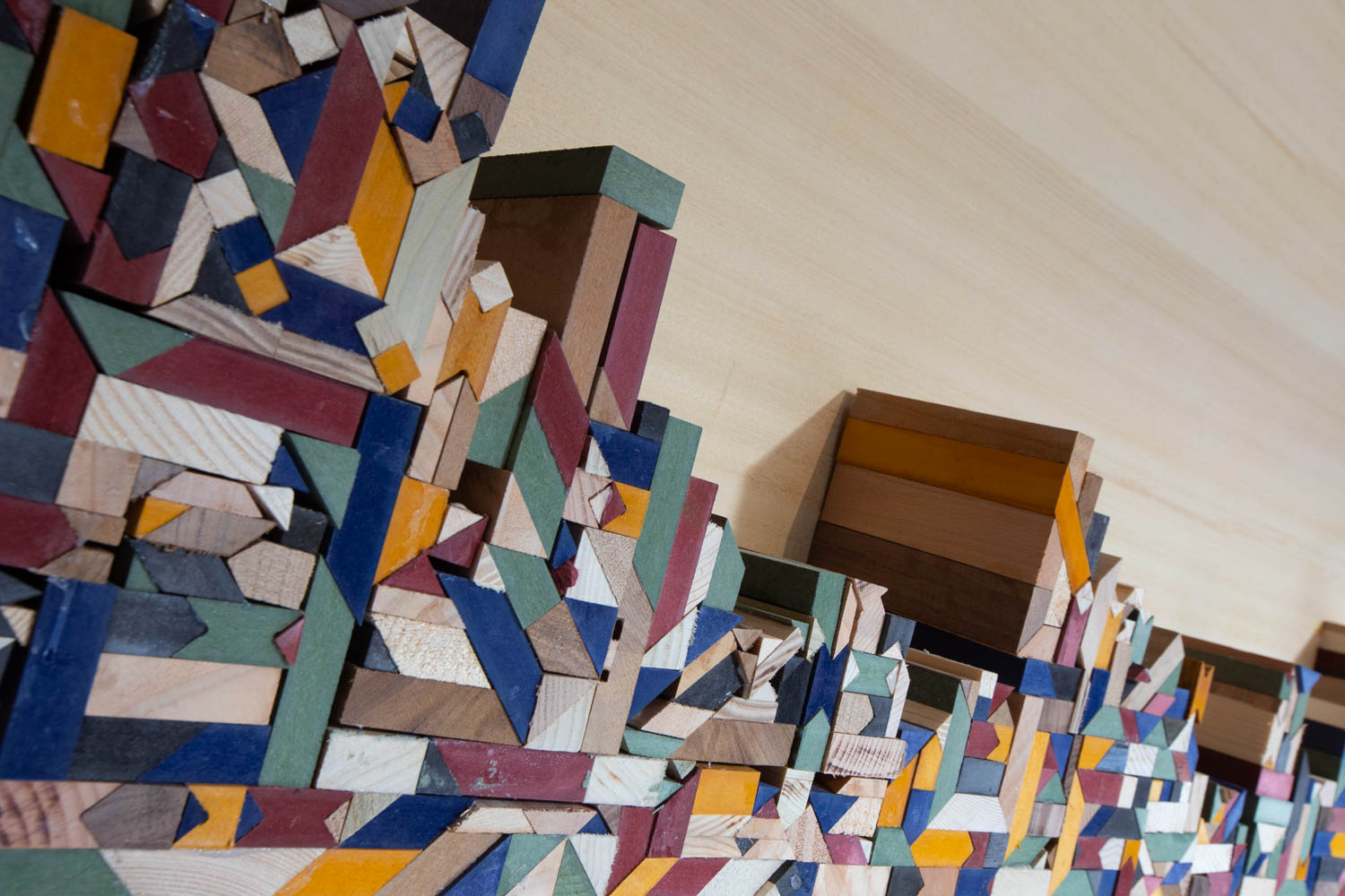 a colorful structure made of wood blocks