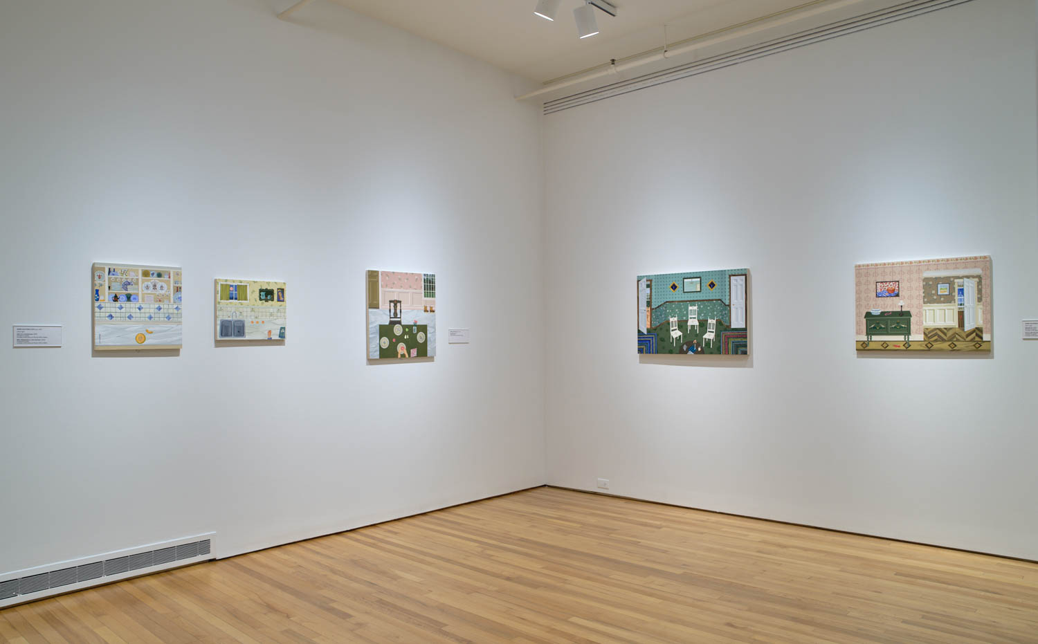 multiple paintings in a room