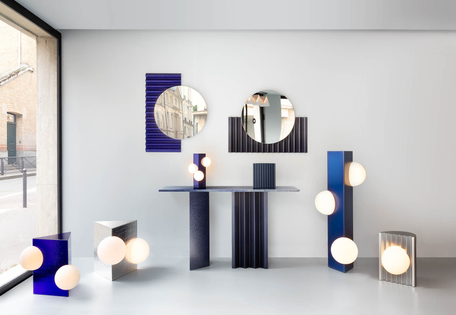 room with multiple round mirrors