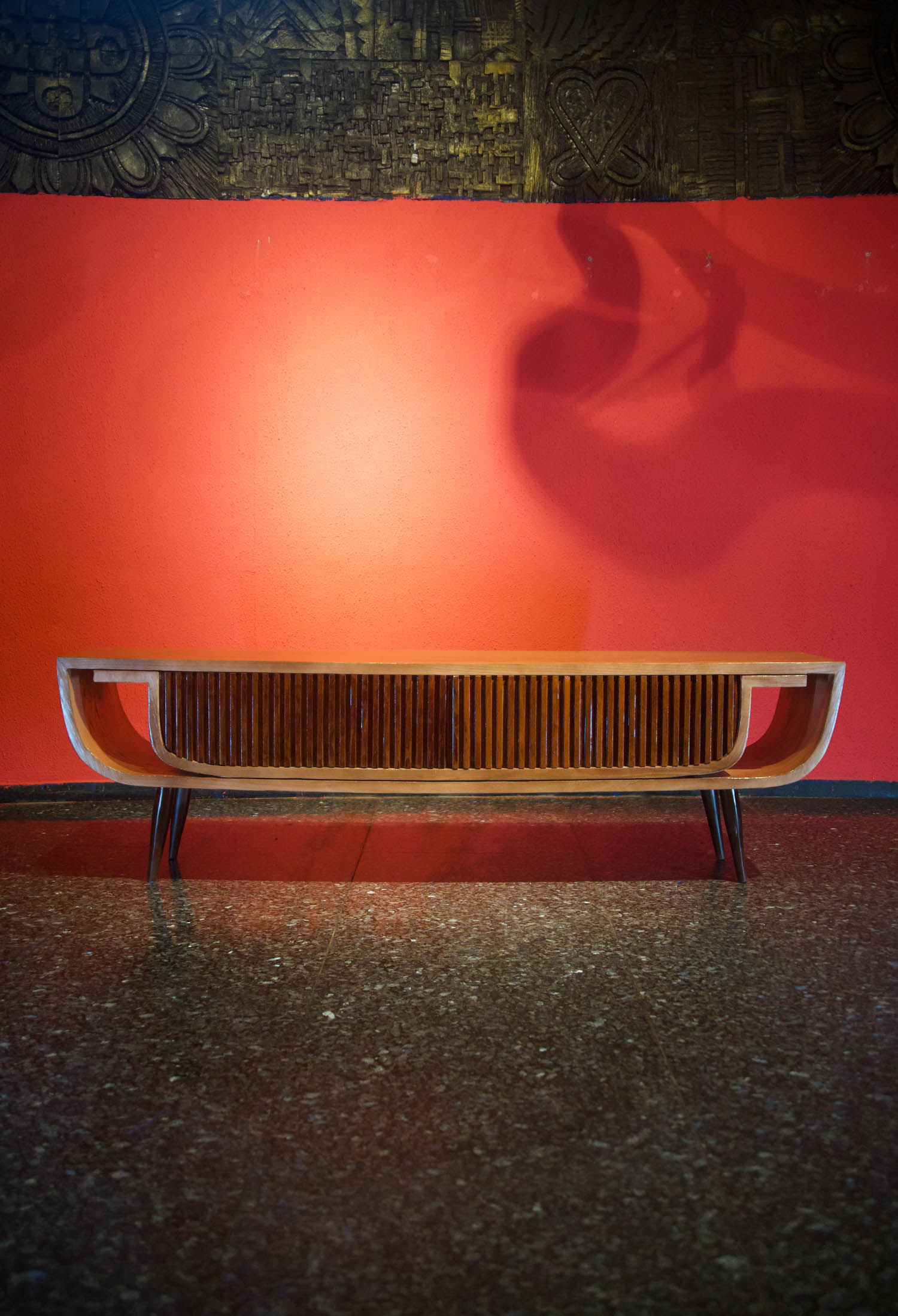 long bench in red room