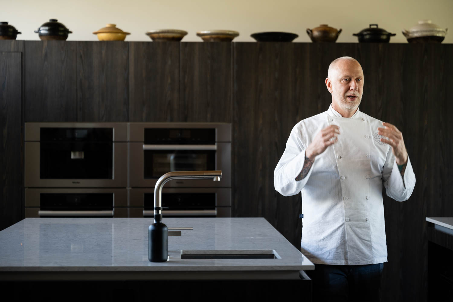 chef talking in kitchen