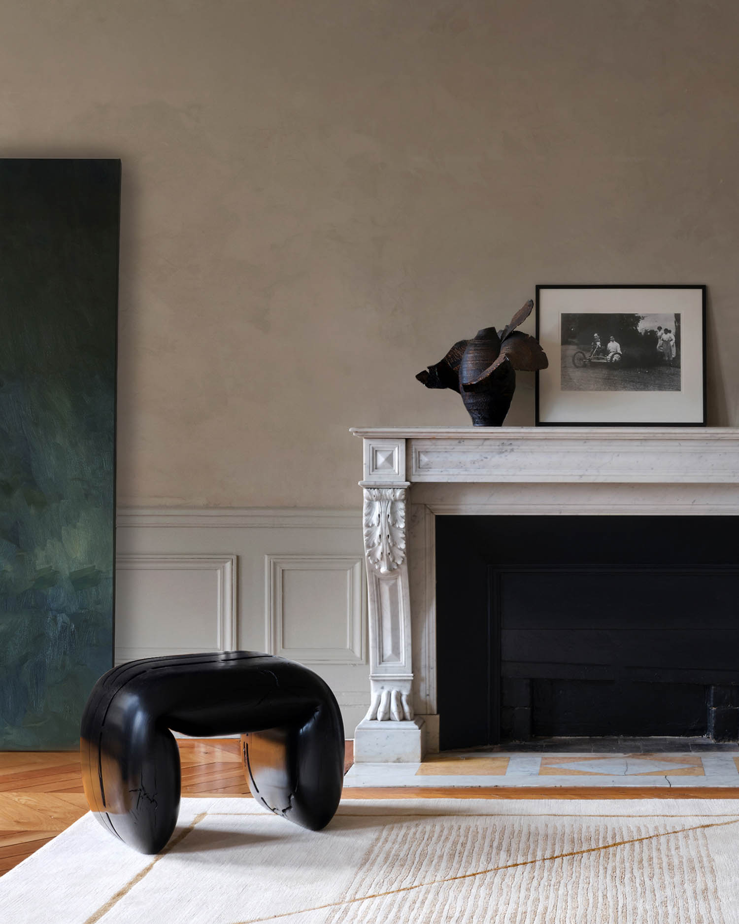 corner of living room with black chair