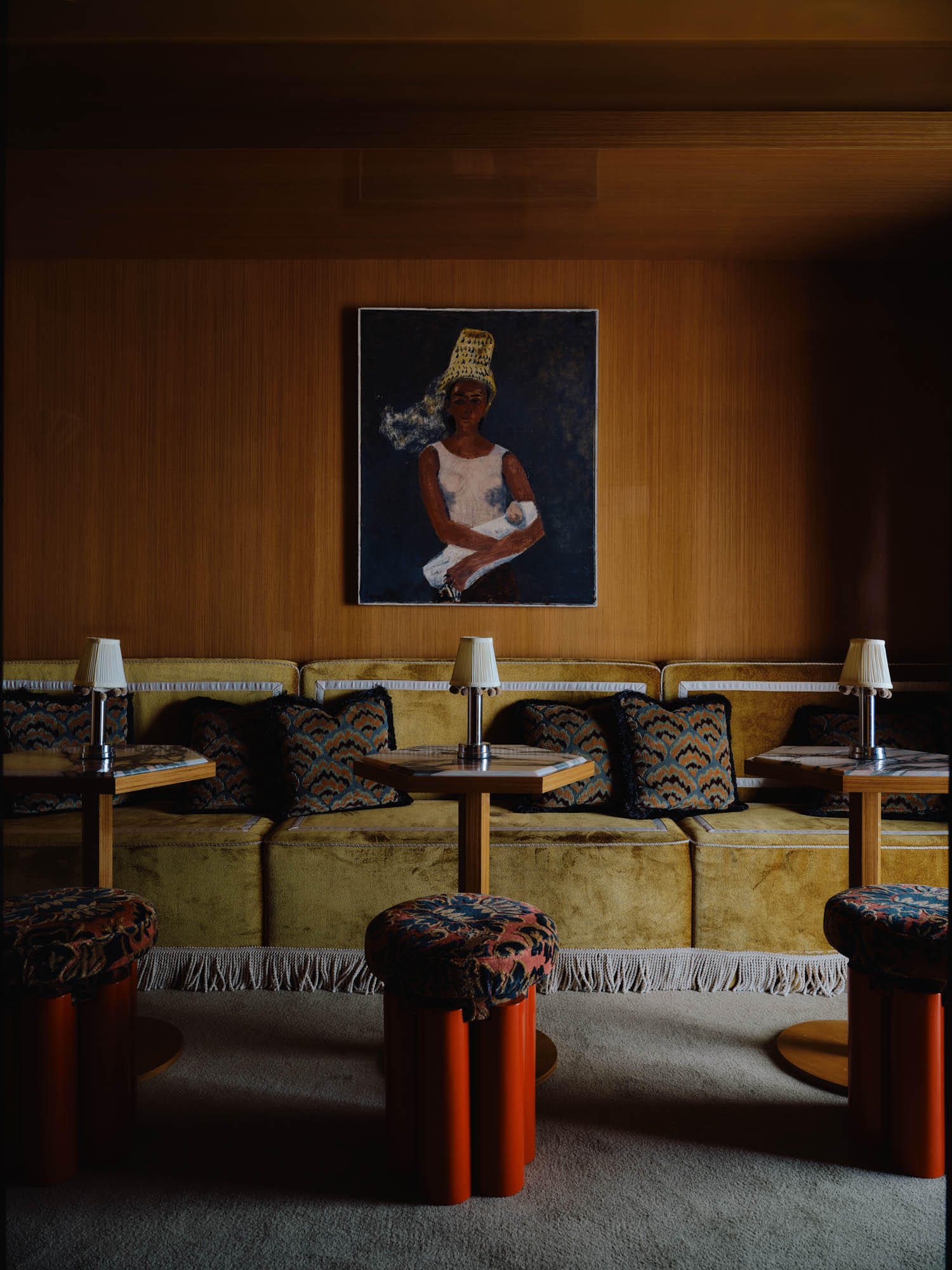 salon seating area with dark yellow chairs