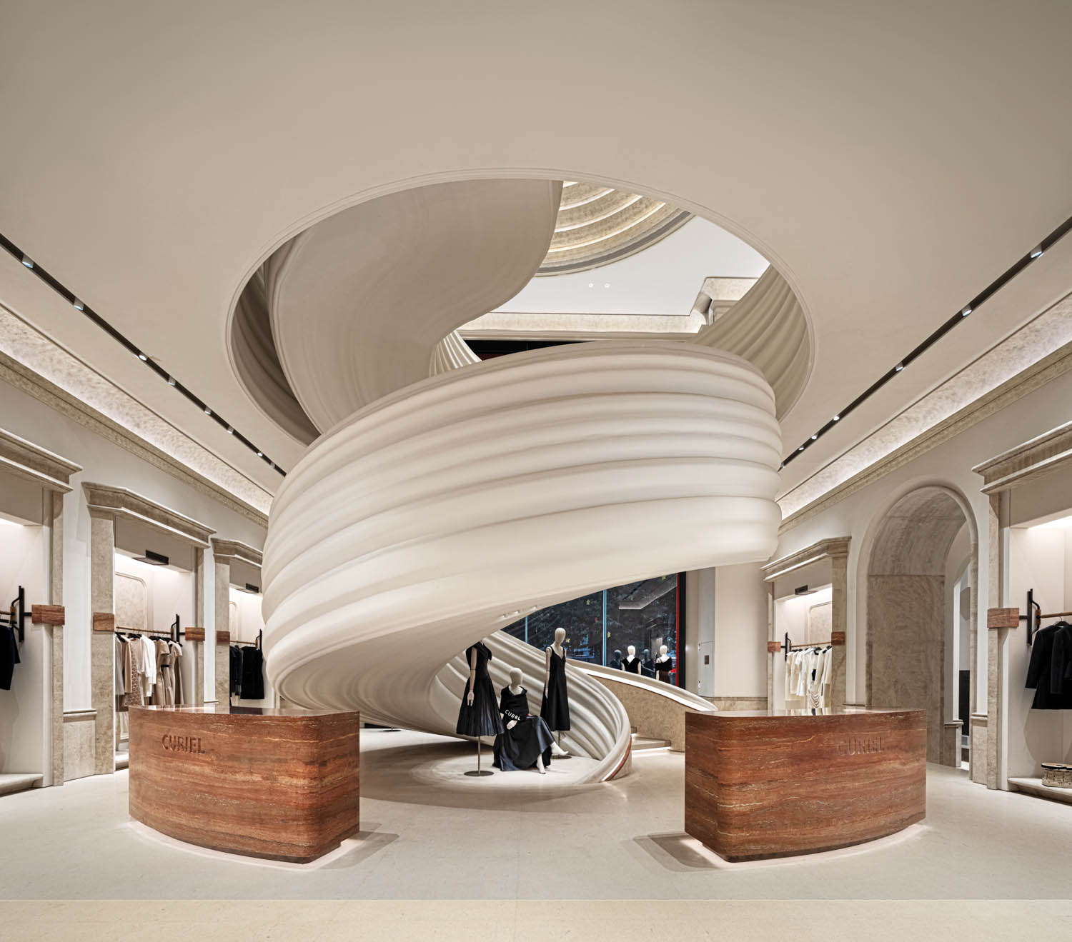 a large white staircase in Casa Curiel showroom