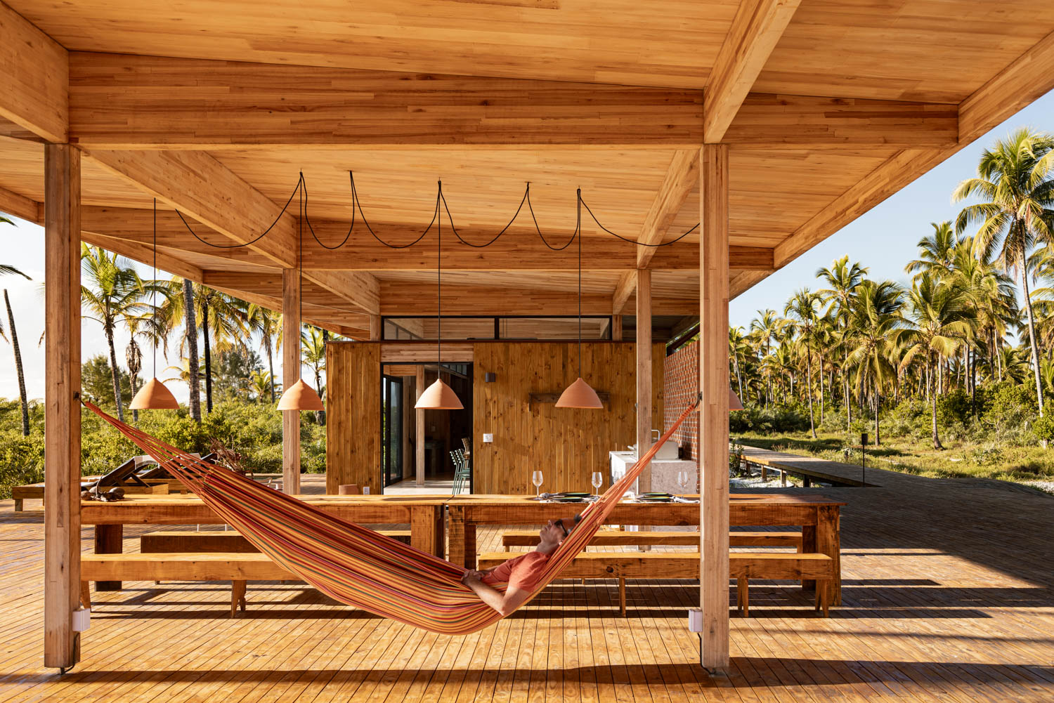dwellings with communal tables and hammocks