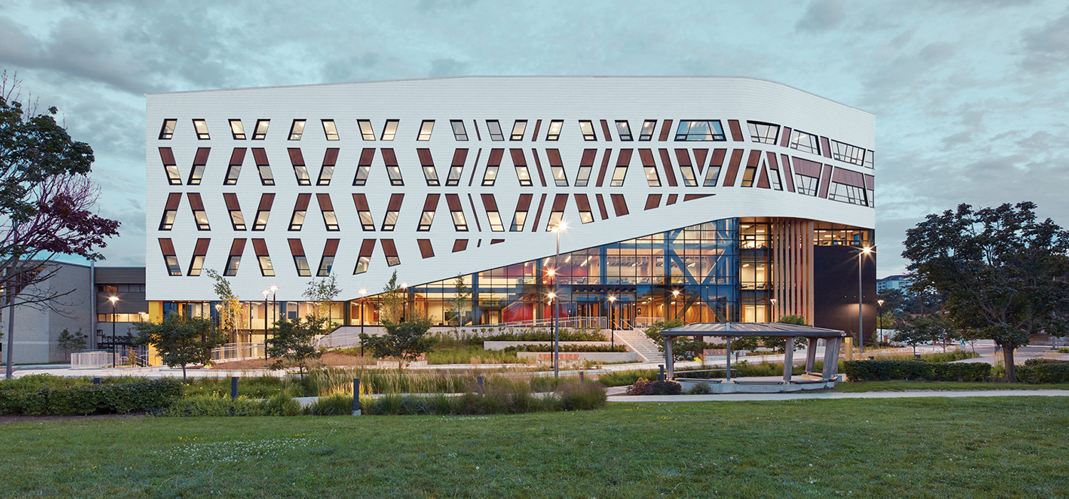 exterior of building with facade that looks like fish scales