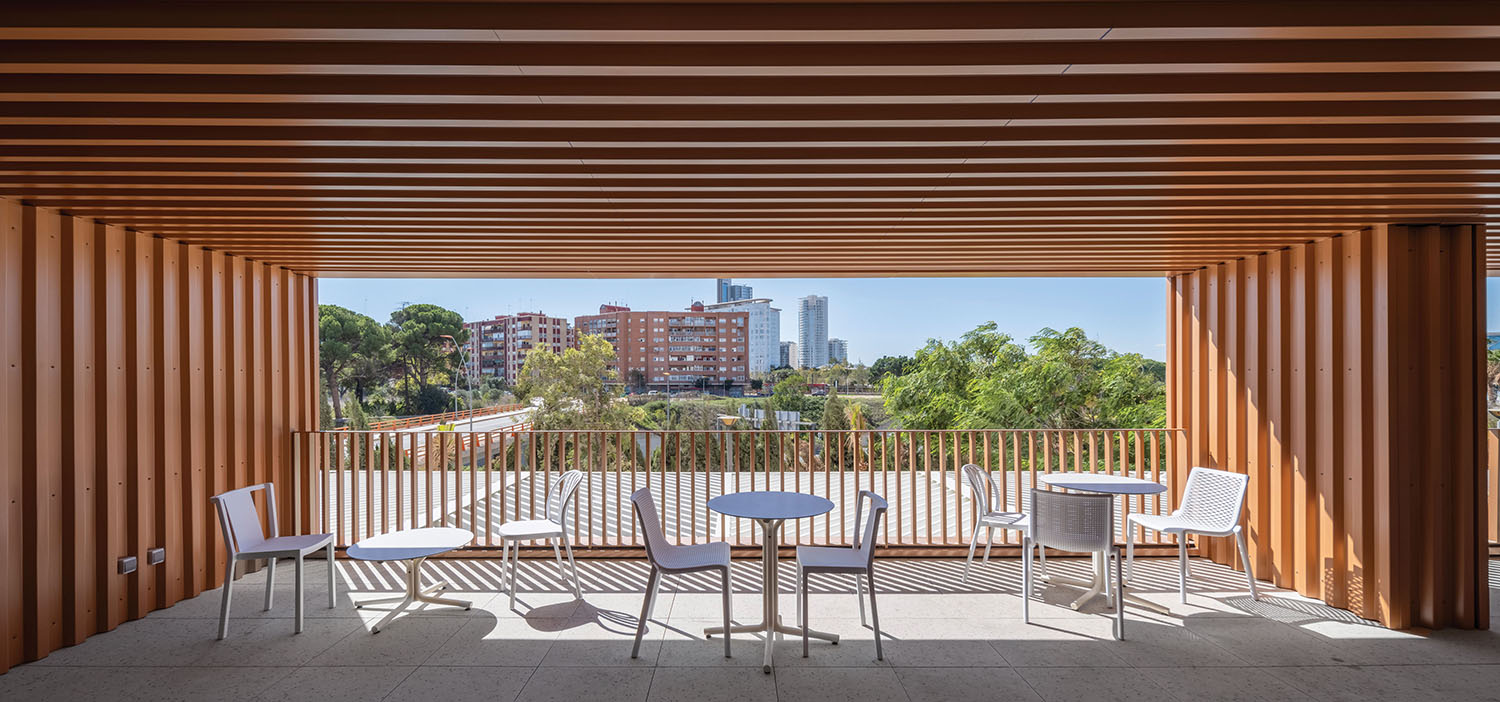 wooden covered patio with chairs