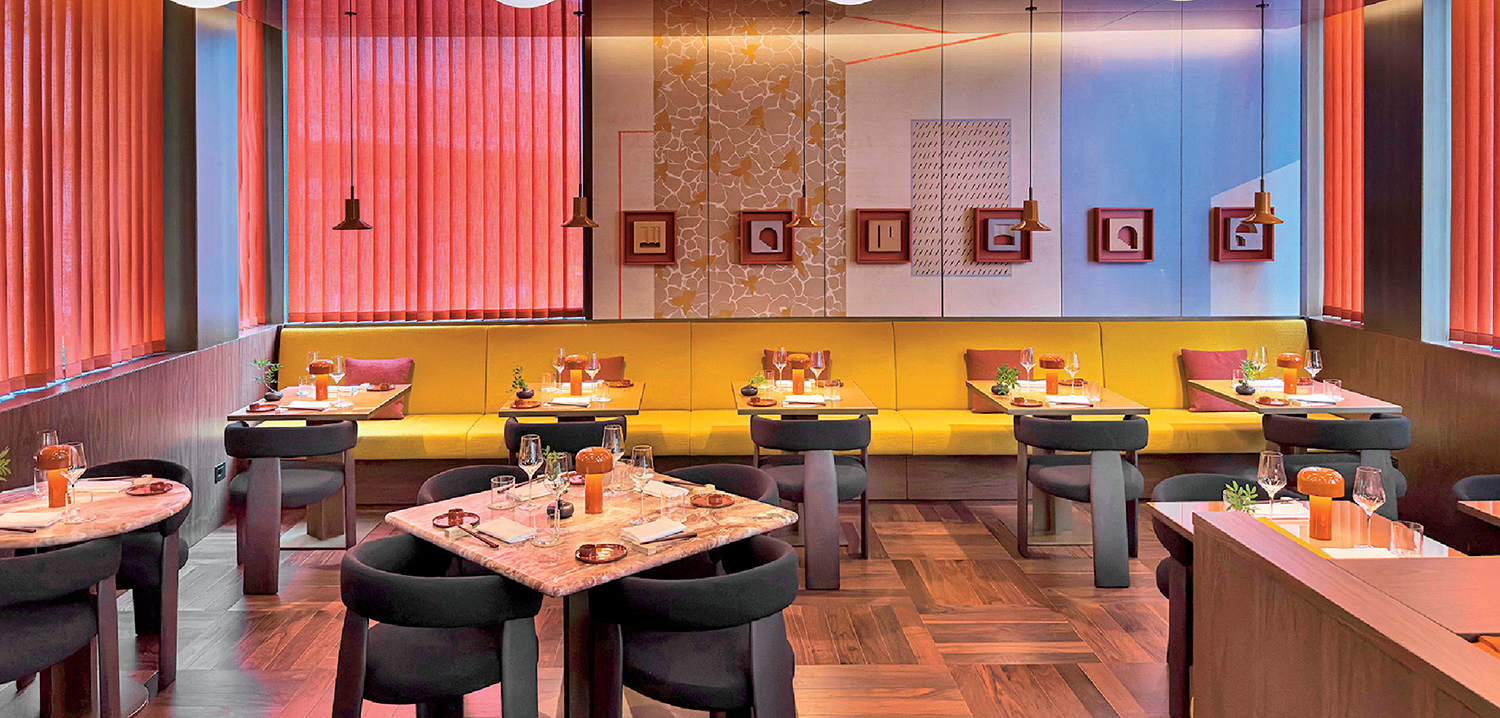 a restaurant with tables and chairs